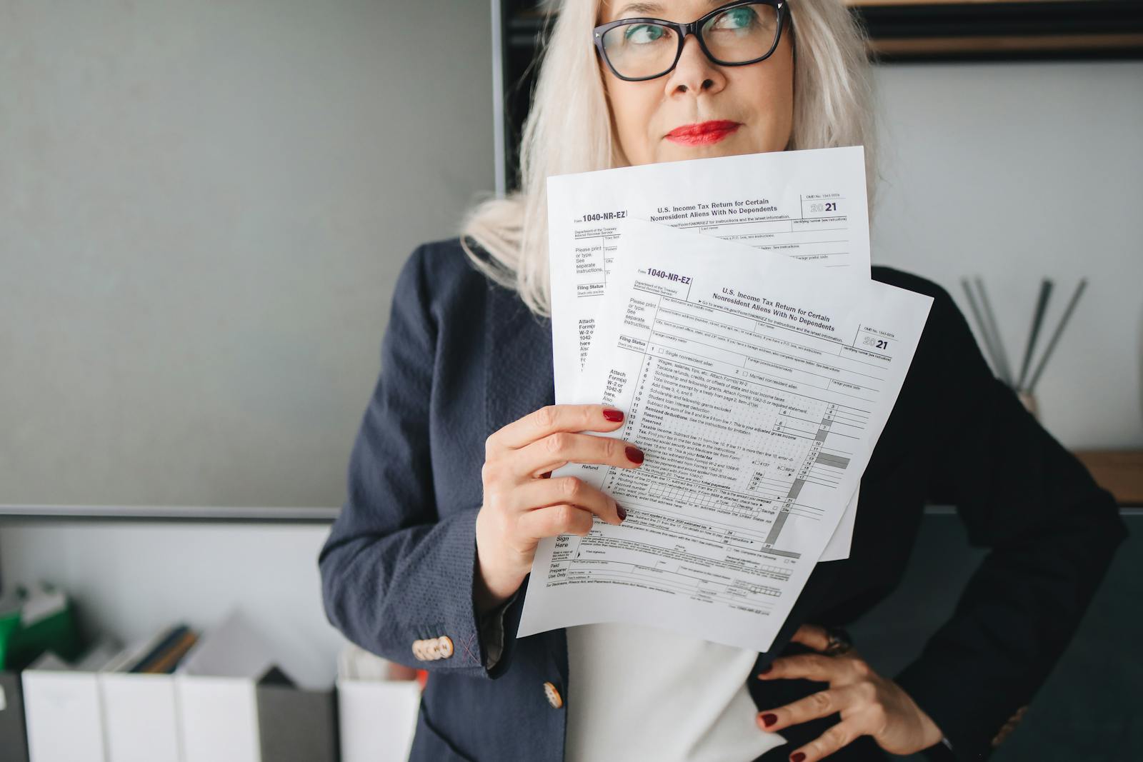 Conseil fiscal immobilier en Belgique 2026 — Fiscaal advies vastgoed: bureau, documents fiscaux et calculatrice